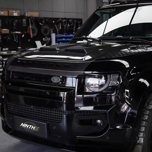 Real 3K carbon fiber Kahn-style bonnet for Defender L663 2020-2025, installed view