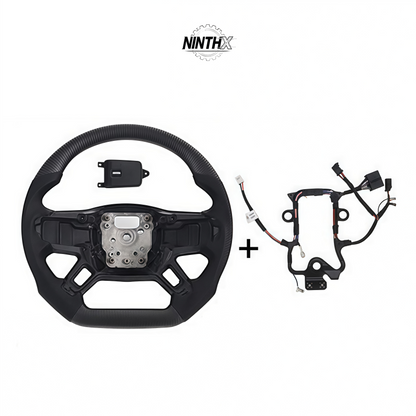 Perforated leather grip racing wheel for Defender L663 90/110/130, full kit view