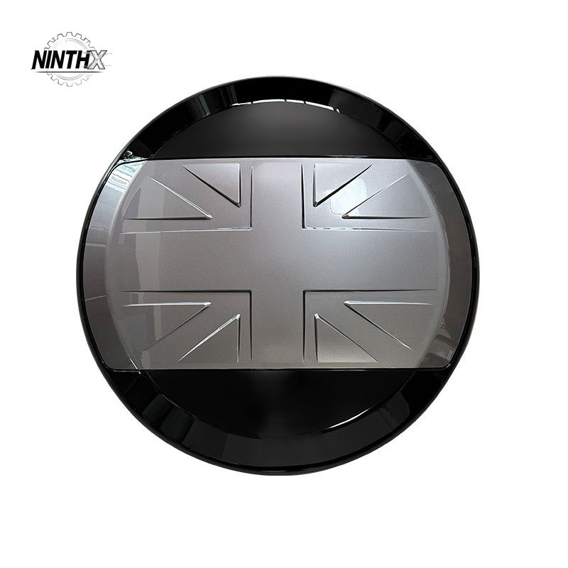 Hard-shell UK-flag spare tire protector on Defender L663 90/110/130, final installed look