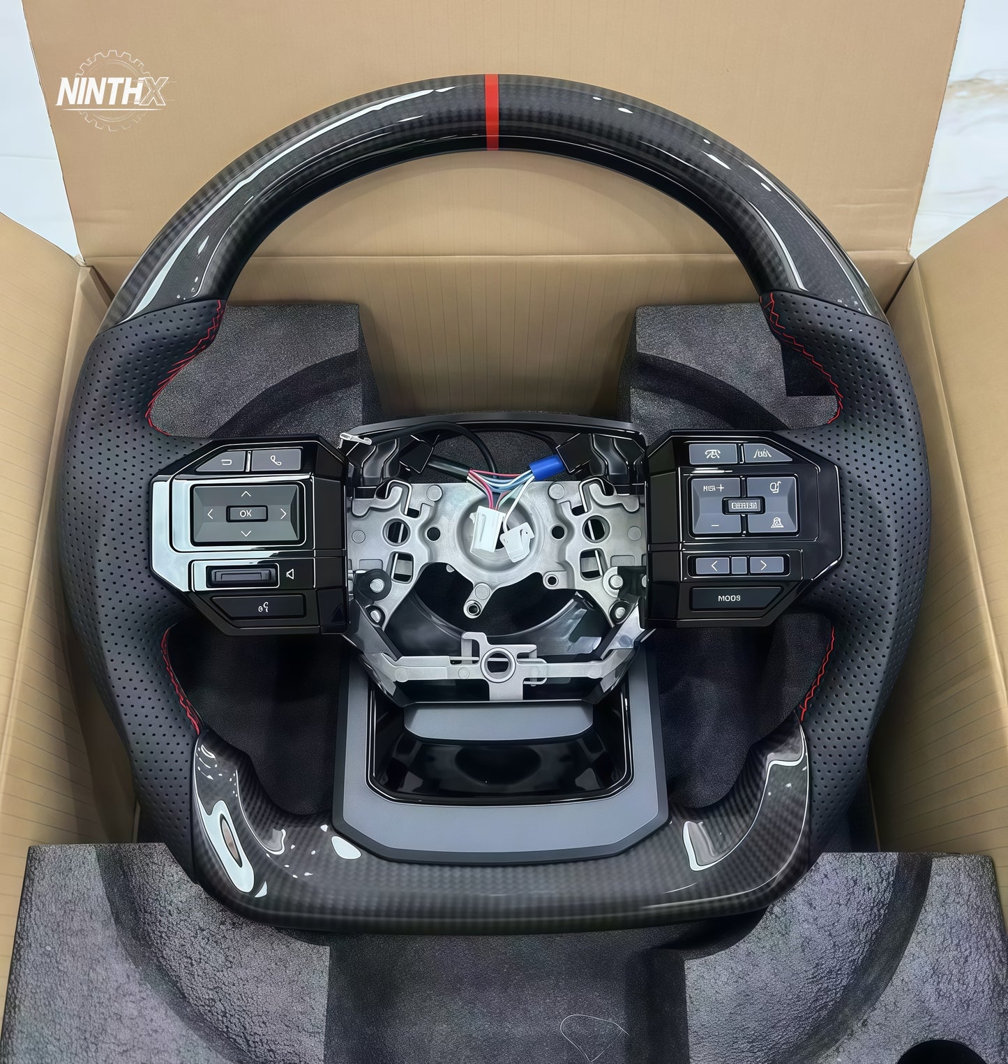 Perforated leather grip carbon fiber steering wheel