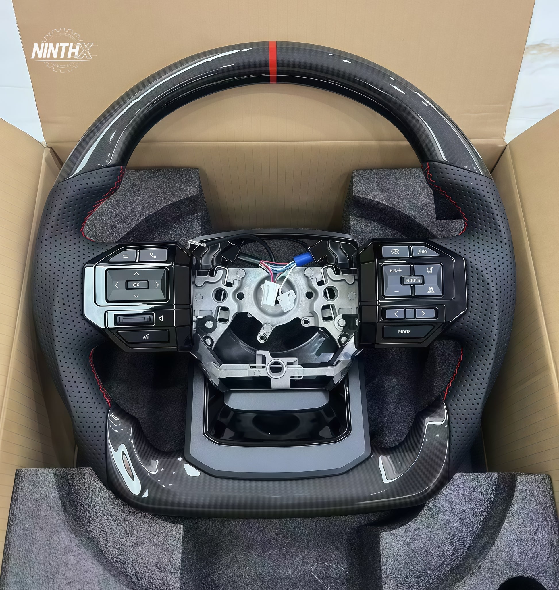 Perforated leather grip carbon fiber steering wheel