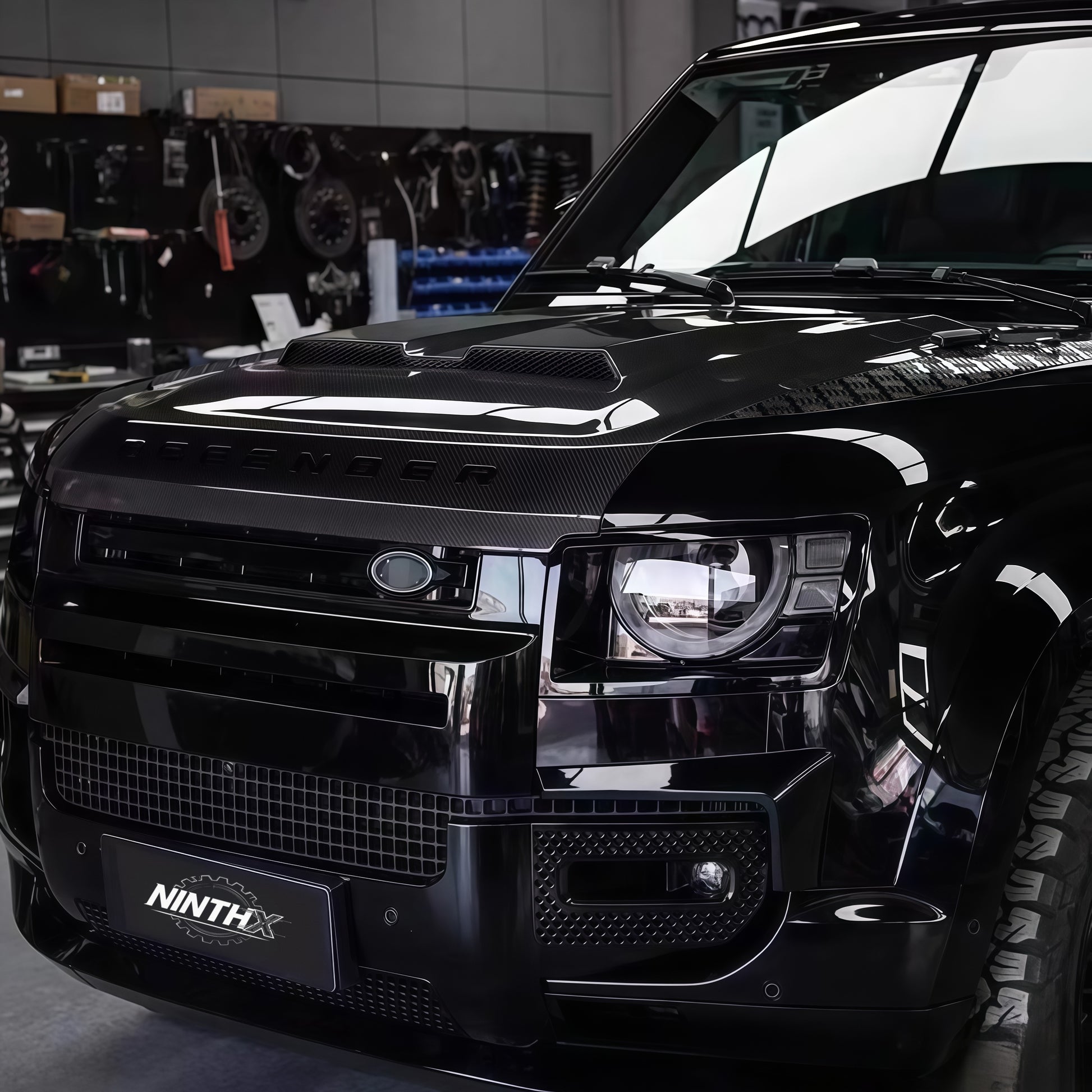 Real 3K carbon fiber Kahn-style bonnet for Defender L663 2020-2025, installed view
