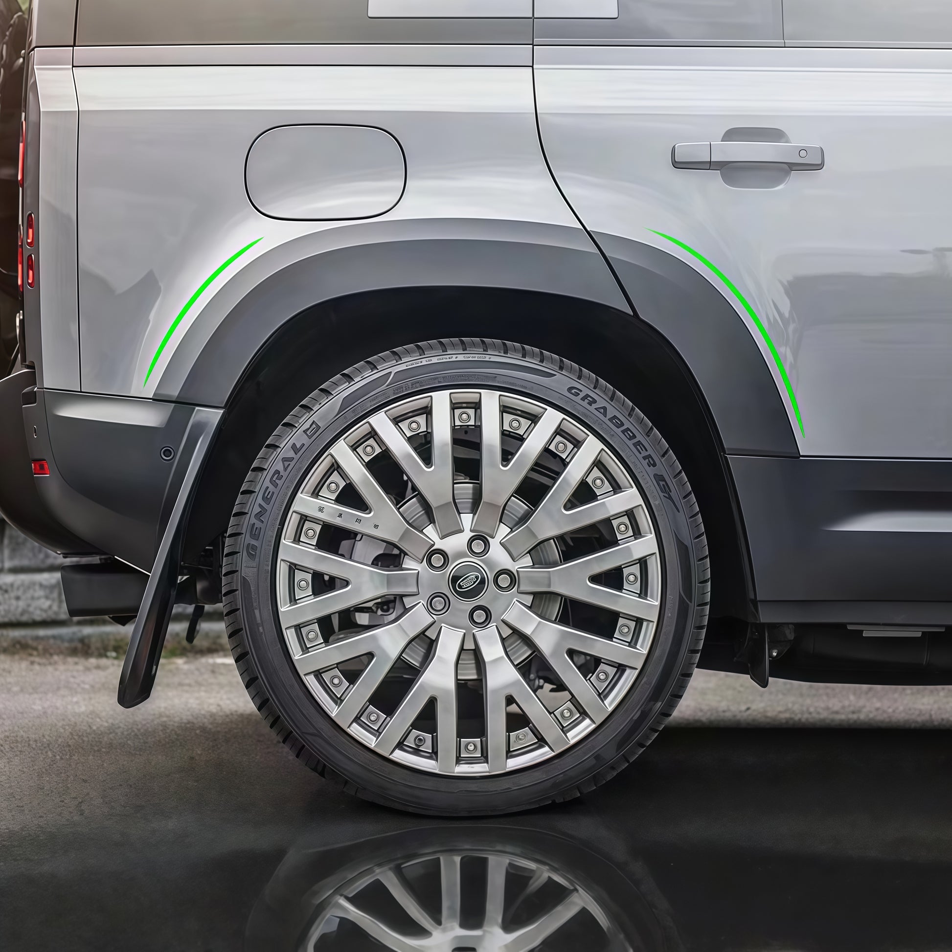 Gloss-black LED fender flares wheel arches for Defender 130 L663, installed view