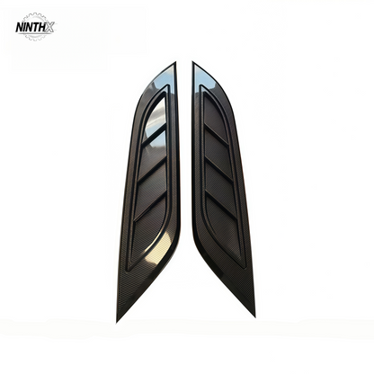 Gloss-black hood air vent grille trim, detail view