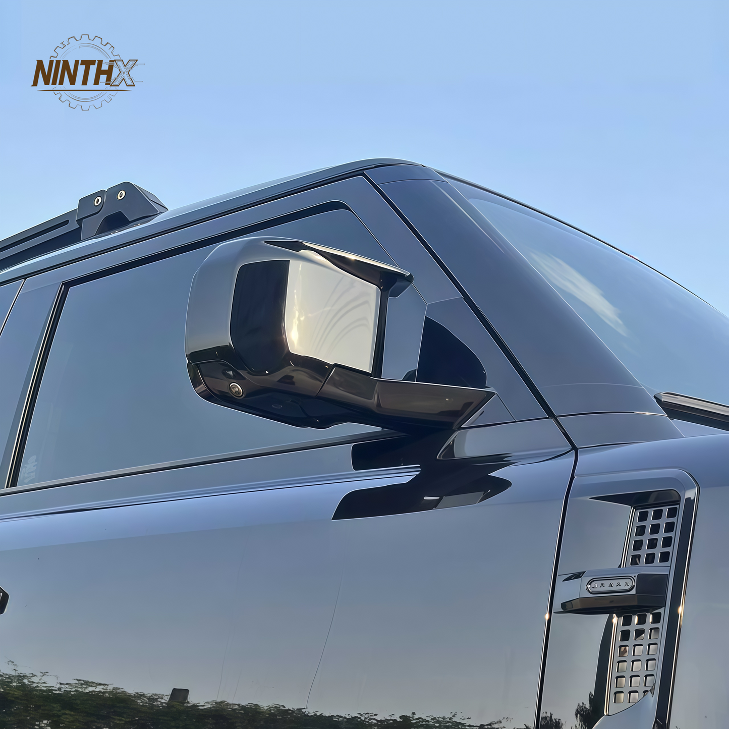 Sport horn-style Defender mirror caps, finish detail