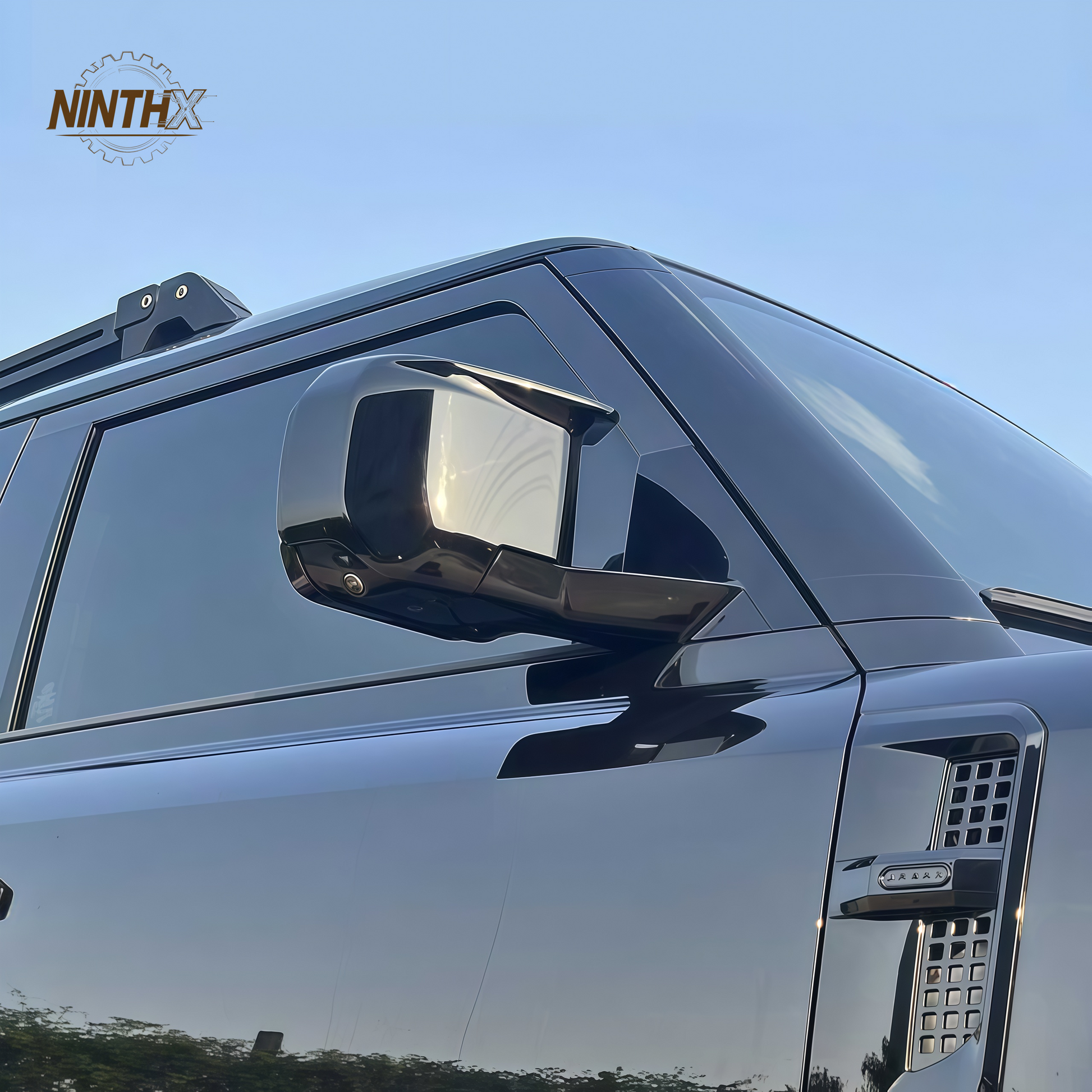 Sport horn-style Defender mirror caps, finish detail