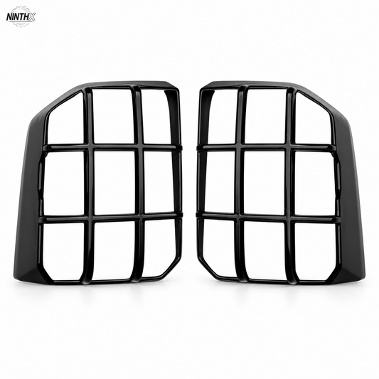 Gloss black tail light guard pair for Toyota Land Cruiser Prado LC250 on a white background.